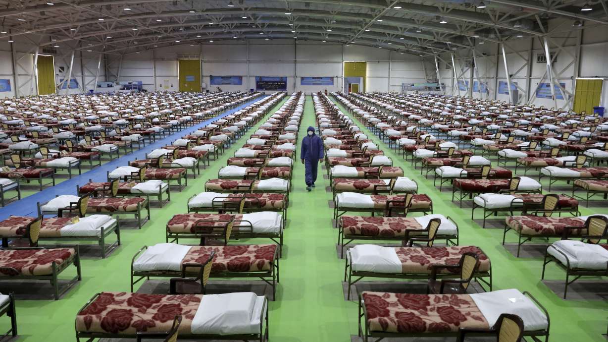 Iran defends virus response as Syria reports first death