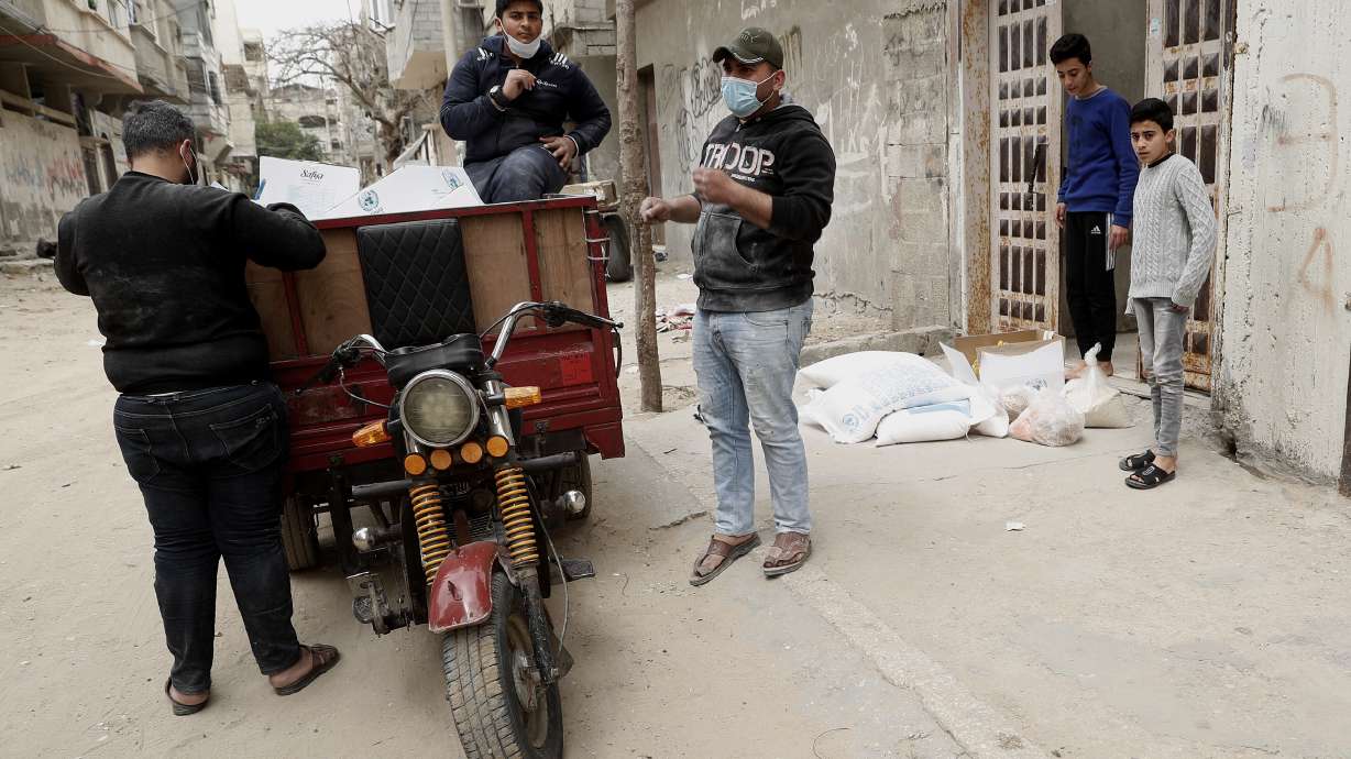 UN begins home food drops for Gaza's needy to stem virus