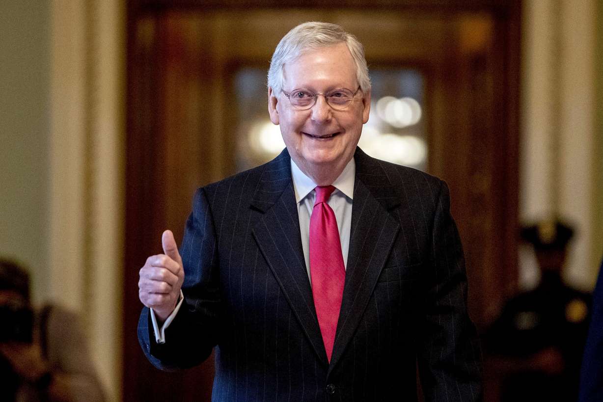 FILE - In this March 25, 2020, file photo, Senate Majority Leader Mitch McConnell, R-Ky. gives a thumbs up as he leaves the Senate chamber on Capitol Hill in Washington, where a deal has been reached on a coronavirus bill. (Photo: AP Photo, File)