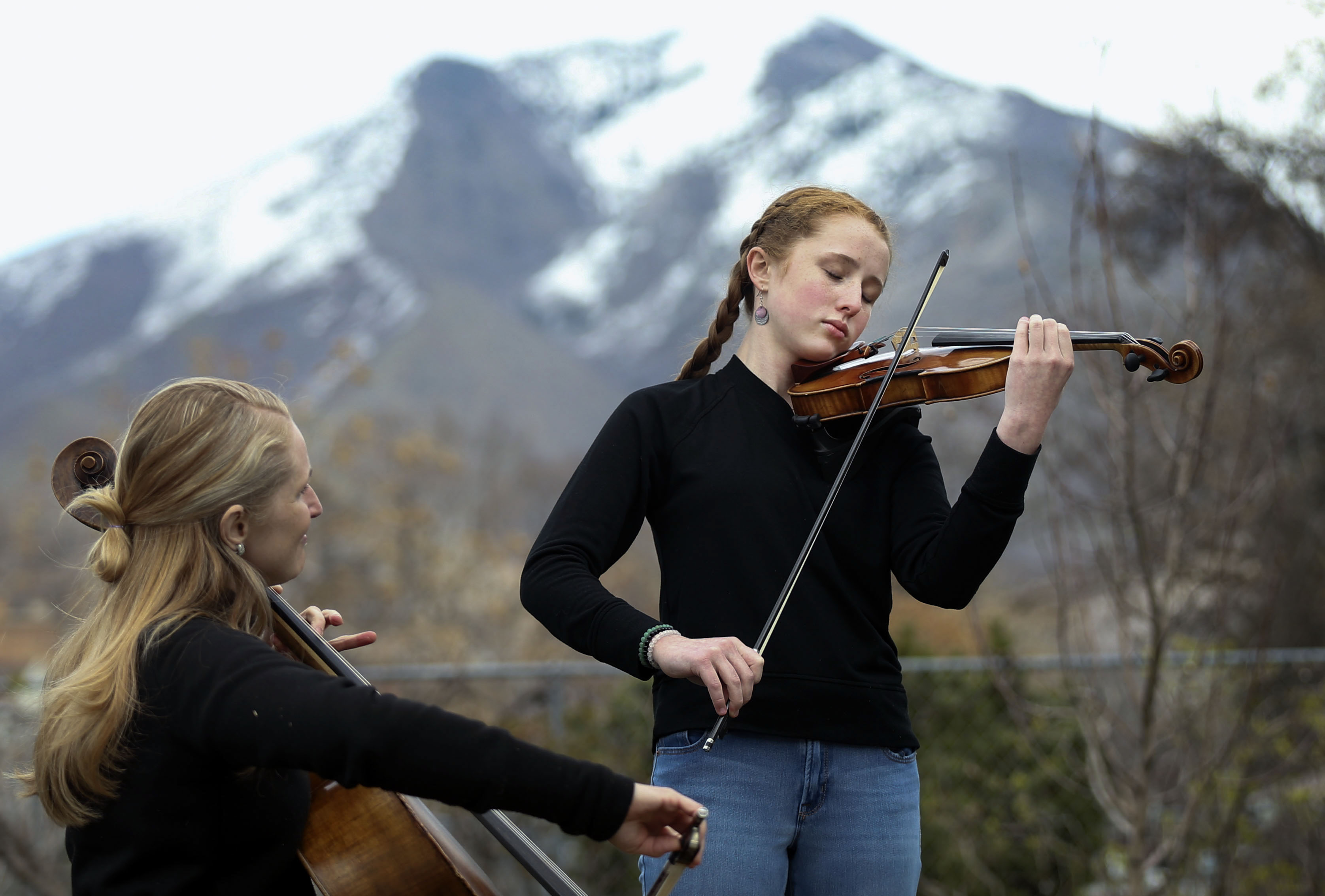 Meet the mother-daughter duo playing pop-up porch concerts for their neighbors