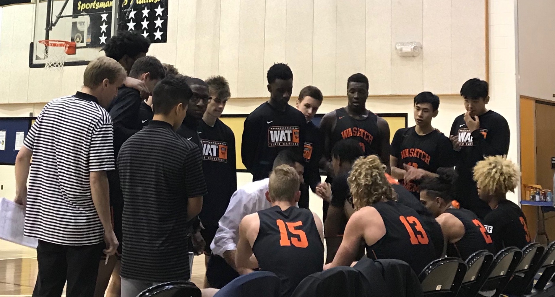 Wasatch Academy coach David Evans and the Tigers against Skyline, December 2019, in Salt Lake City.