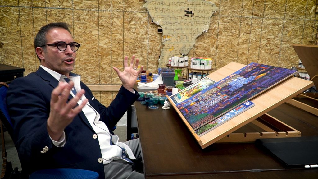 Eric Dowdle explains the subjects he likes to paint while working in his Lindon studio Sunday, April 5, 2020. (Photo: Ray Boone, KSL TV)