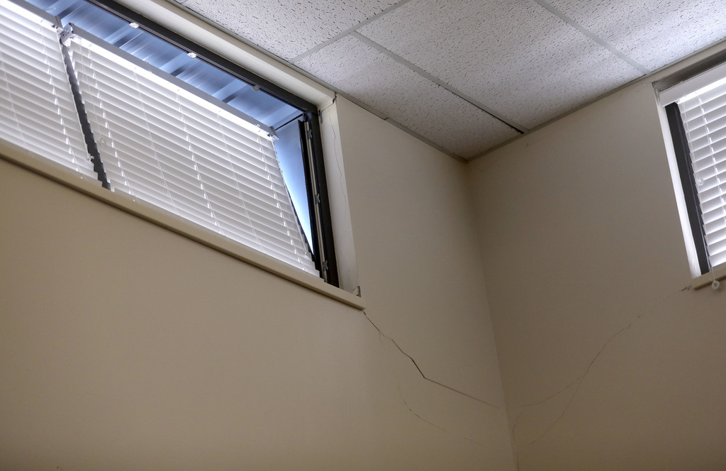 Displaced windows cracks in the walls at Cyprus High School in Magna are pictured on Monday, April 6, 2020. The damage was caused by a recent 5.7 magnitude earthquake its aftershocks centered near the town. (Photo: Kristin Murphy, KSL)