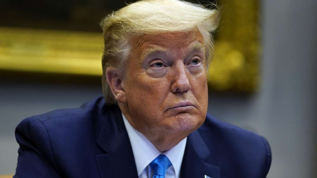 Trump upends virus oversight, removing key official