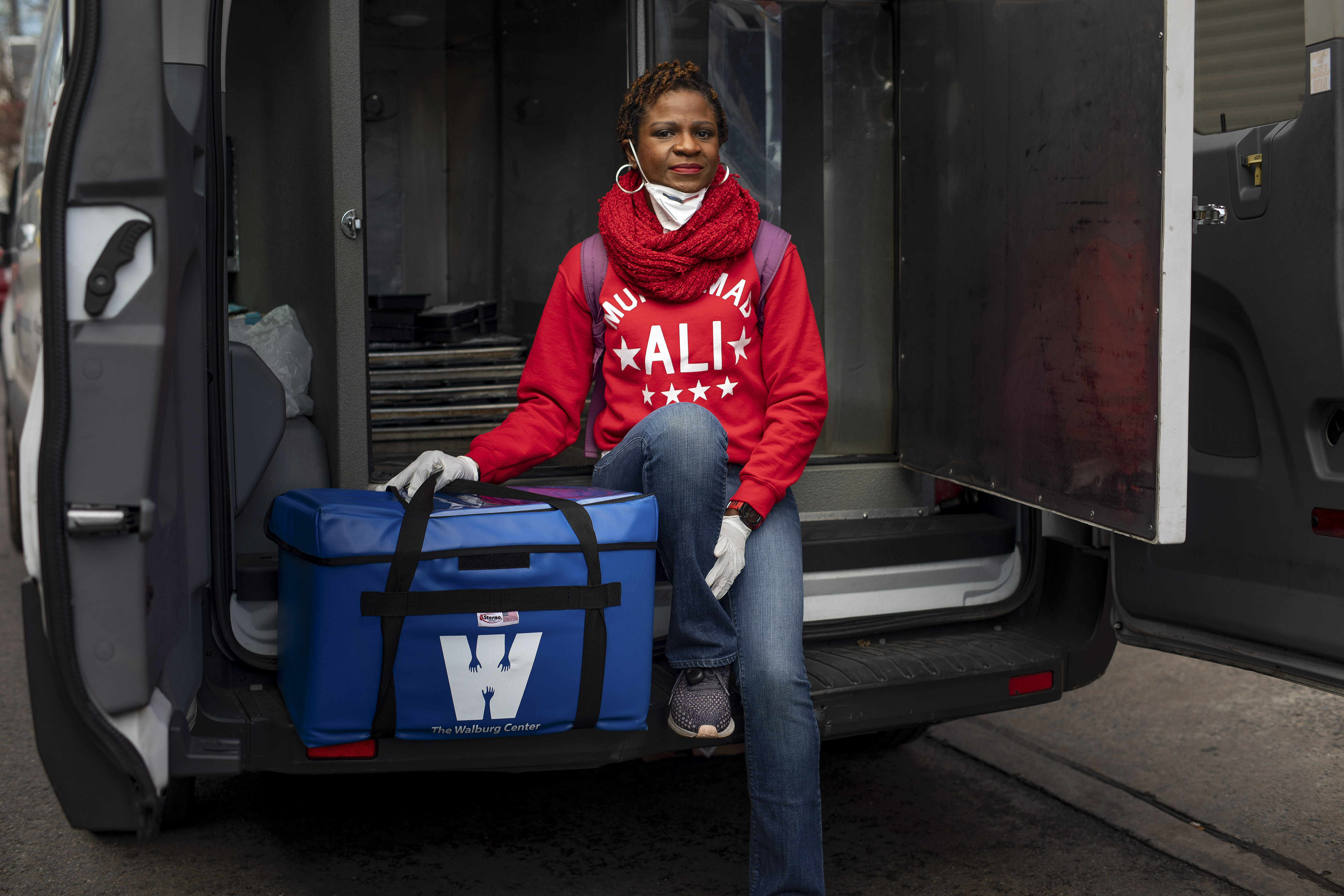 As elderly are left alone, a race to deliver food they need