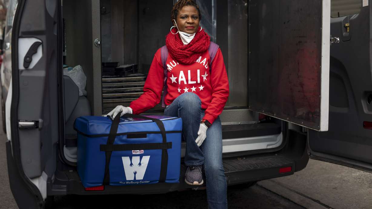 As elderly are left alone, a race to deliver food they need