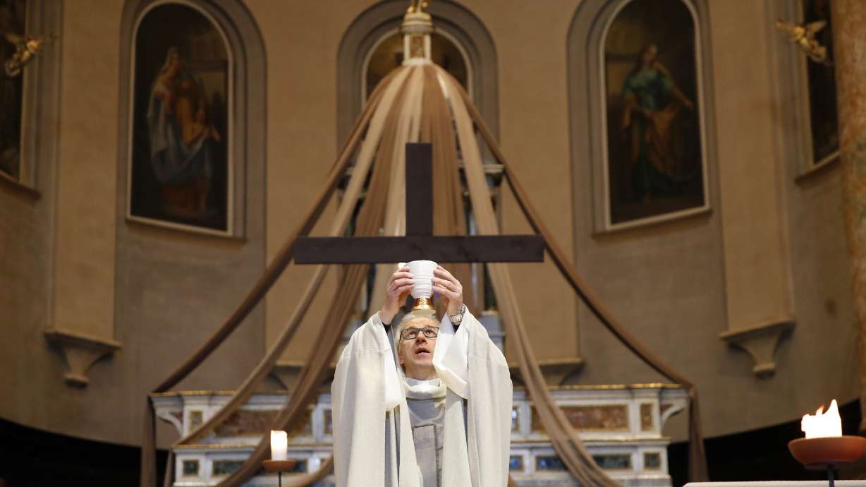 As Easter nears, virus deaths test Italian priest's faith