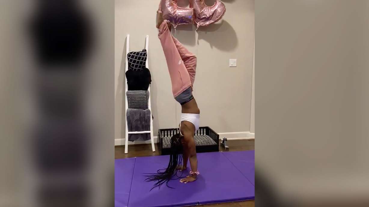 Good luck topping this one. Simone Biles has taken the handstand challenge to the next level