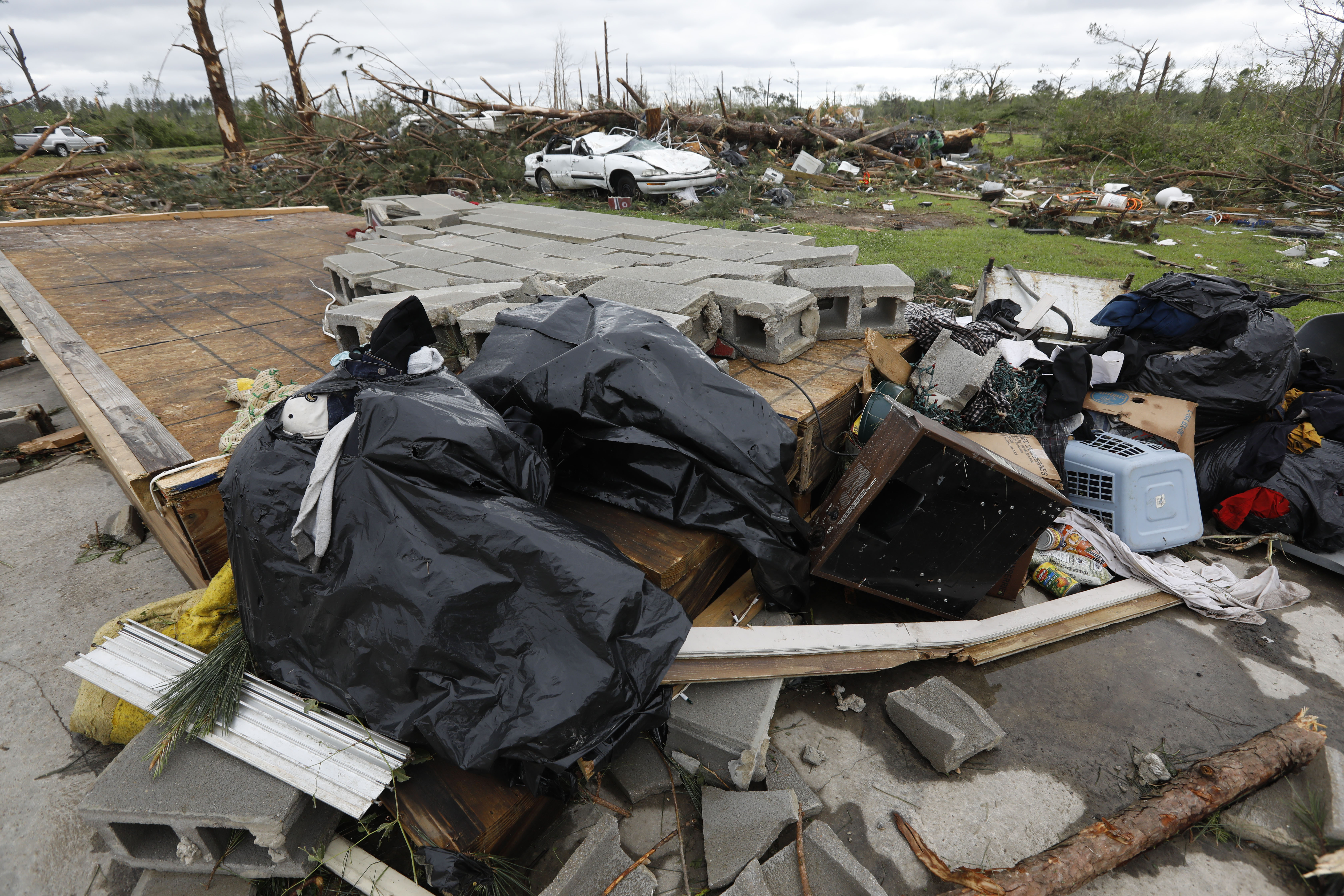 No hugs or handshakes: Pandemic complicates storm relief