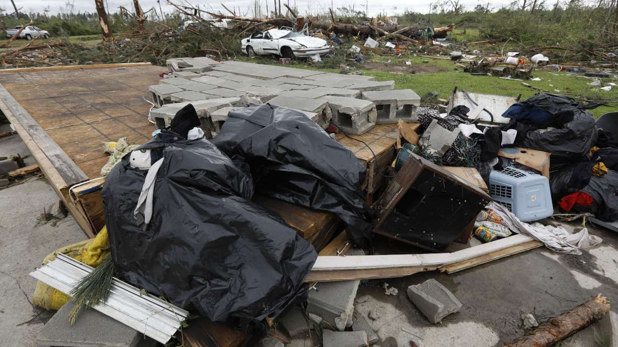 No hugs or handshakes: Pandemic complicates storm relief