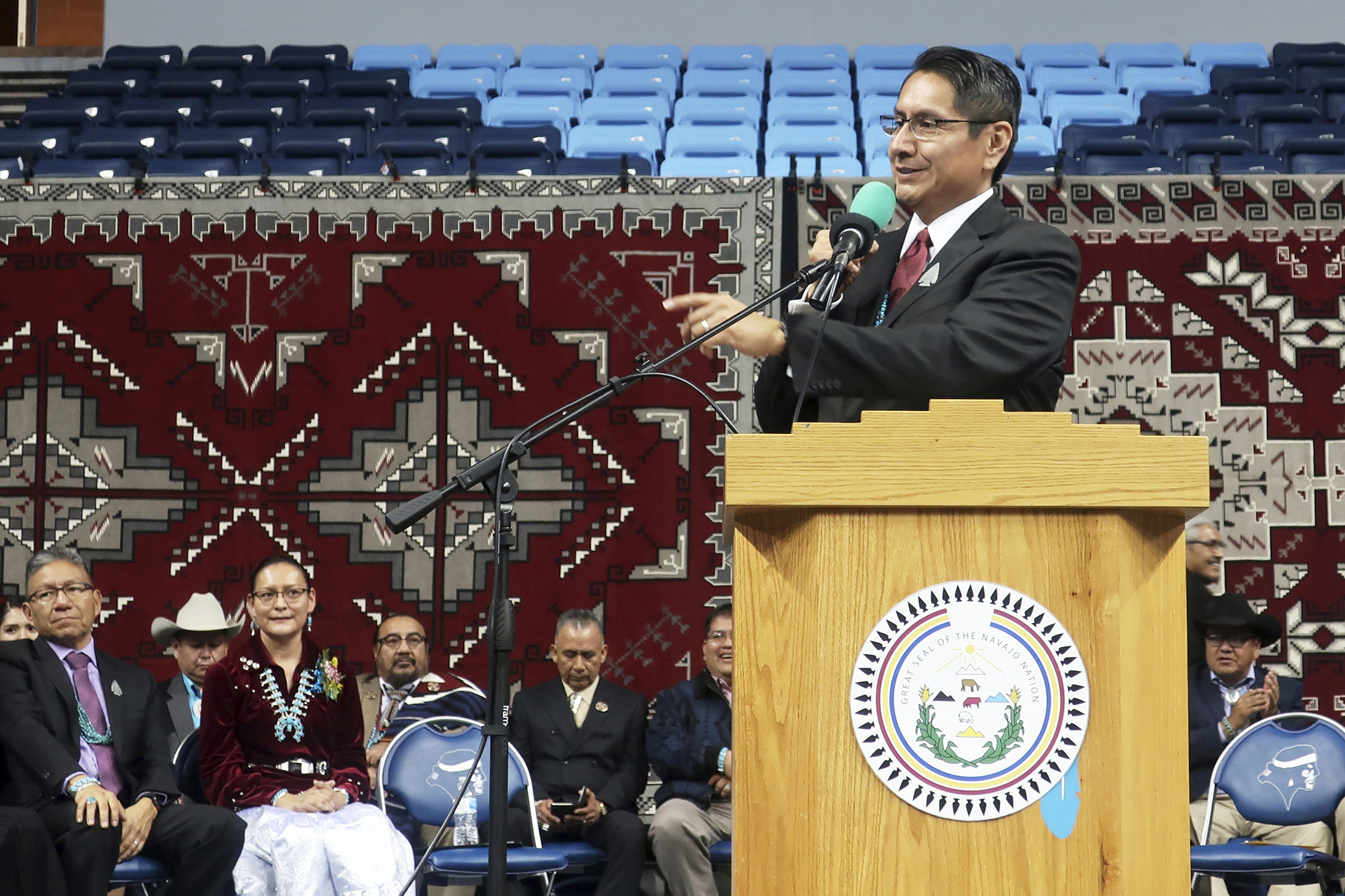 FILE - In this Jan. 15, 2019, file photo, Jonathan Nez addresses a crowd after he was sworn in as president of the Navajo Nation in Fort Defiance, Ariz. (AP Photo/Felicia Fonseca, File)