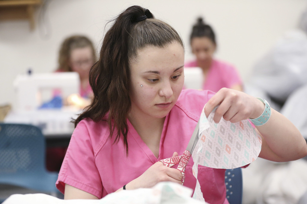 Team of women inmates churning out cloth masks from Utah County Jail
