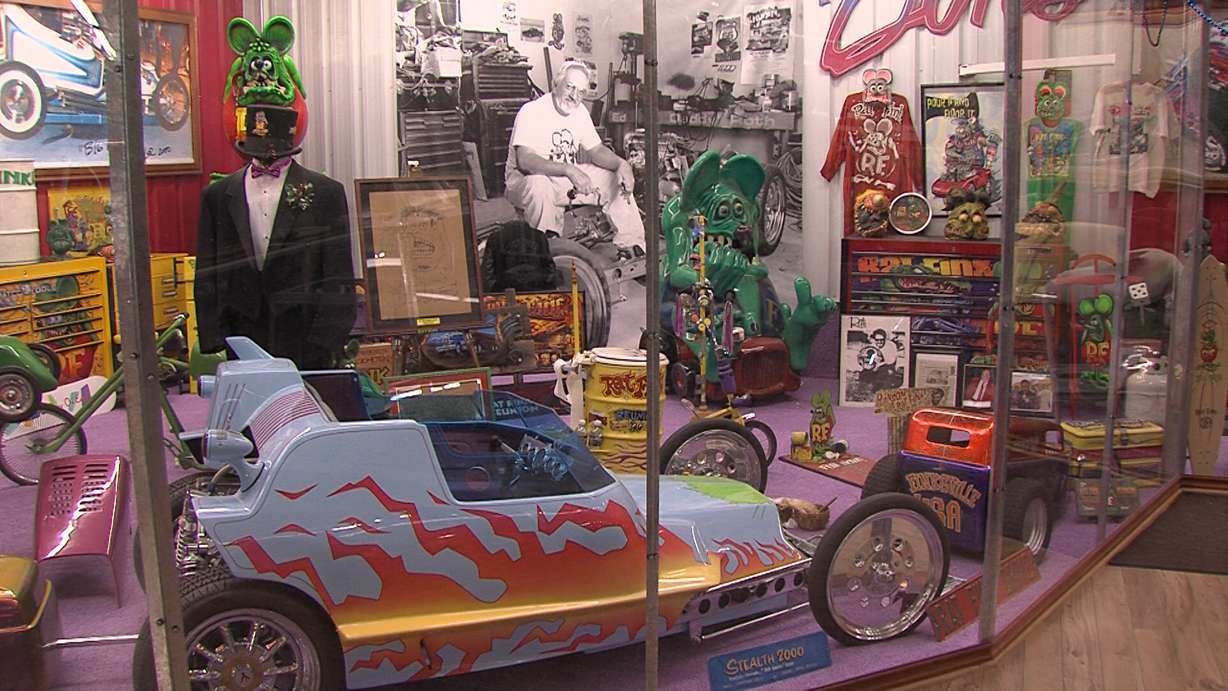 A collection of Ed Roth's creations in the Rat Fink Museum. Ed's in the black-and-white photo on the back wall. (Photo: Brian Champagne)