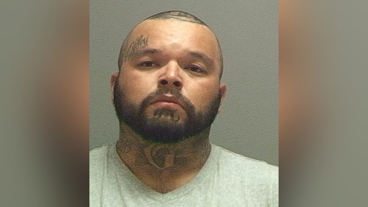 Parole fugitive arrested, suspected of firing shots at officer in West Valley City