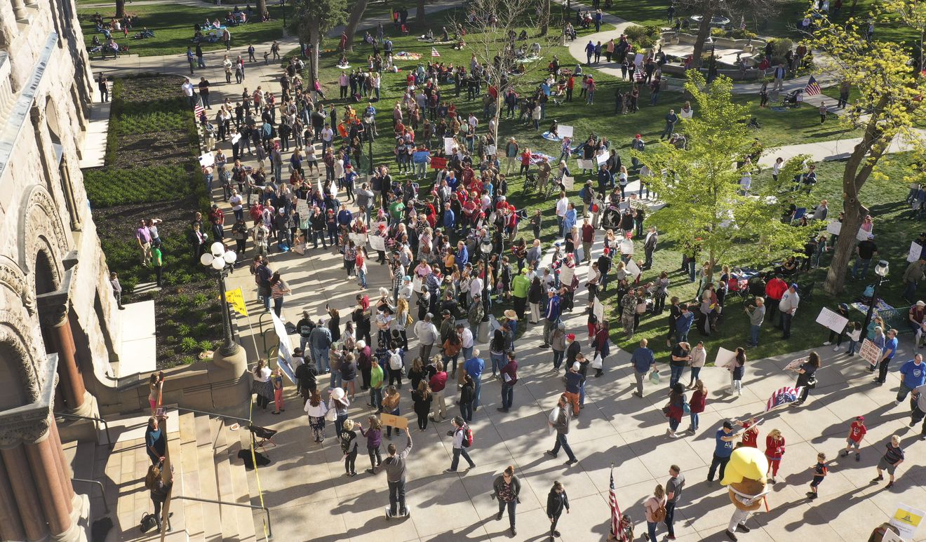Members of the group “Freedom in the Numbers! No More Social Distance!” rally against a state stay-at-home request at the Salt Lake City-County Building in Salt Lake City on Saturday, April 18, 2020. (Photo: Jeffrey D. Allred, KSL, File)