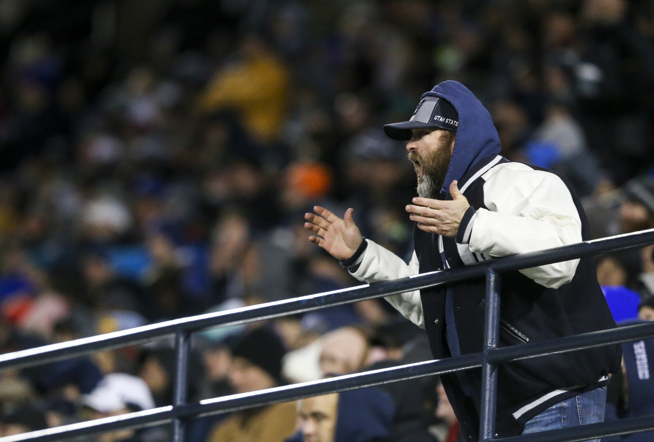 A Utah State Aggies fan questions the call of roughing the kicker against the Aggies during the second half of an NCAA football game at Maverik Stadium in Logan on Saturday, Nov. 2, 2019. The Brigham Young Cougars took back the wagon wheel in a dominant 42-14 victory over the Utah State Aggies.
