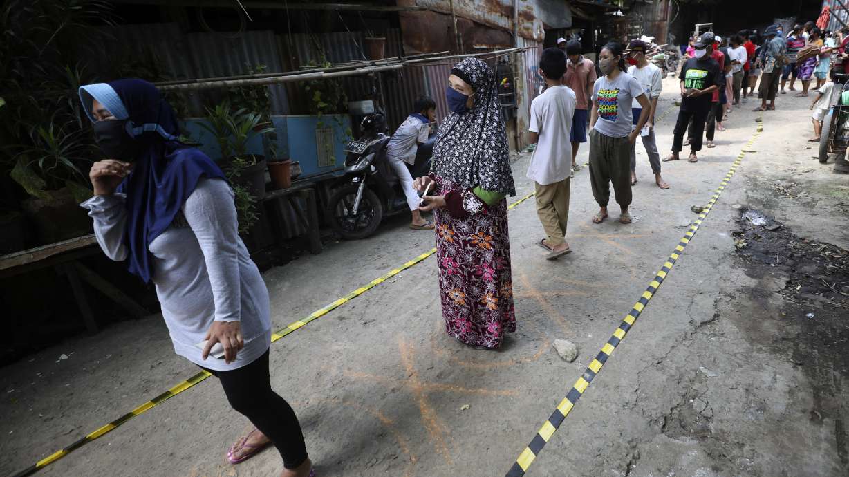 Asia Today: Jakarta suspends passenger flights, rail service