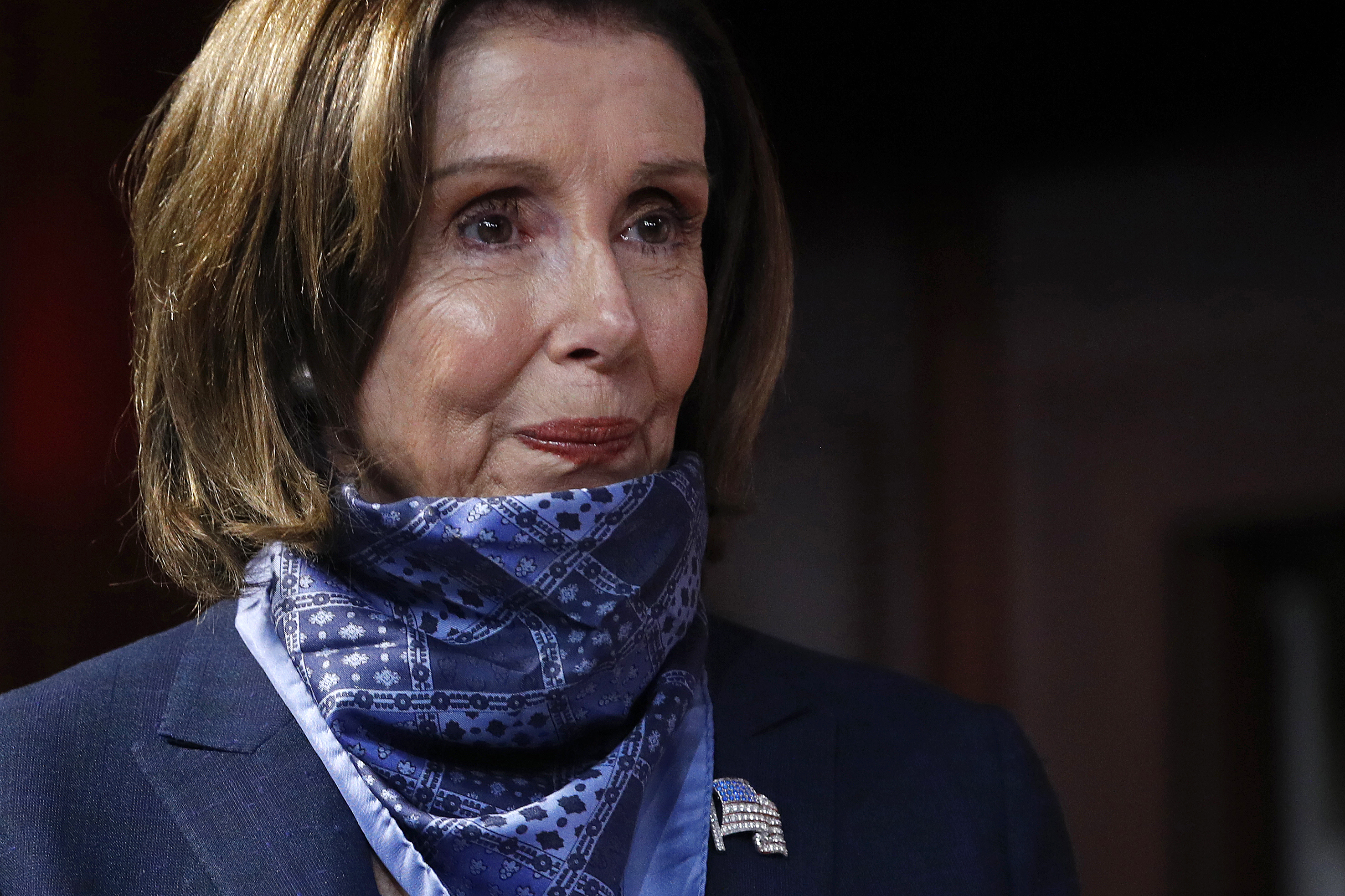 House Speaker Nancy Pelosi of Calif., waits to speak with reporters after the Senate approved a nearly $500 billion coronavirus aid bill, Tuesday, April 21, 2020, on Capitol Hill in Washington. (AP Photo/Patrick Semansky)