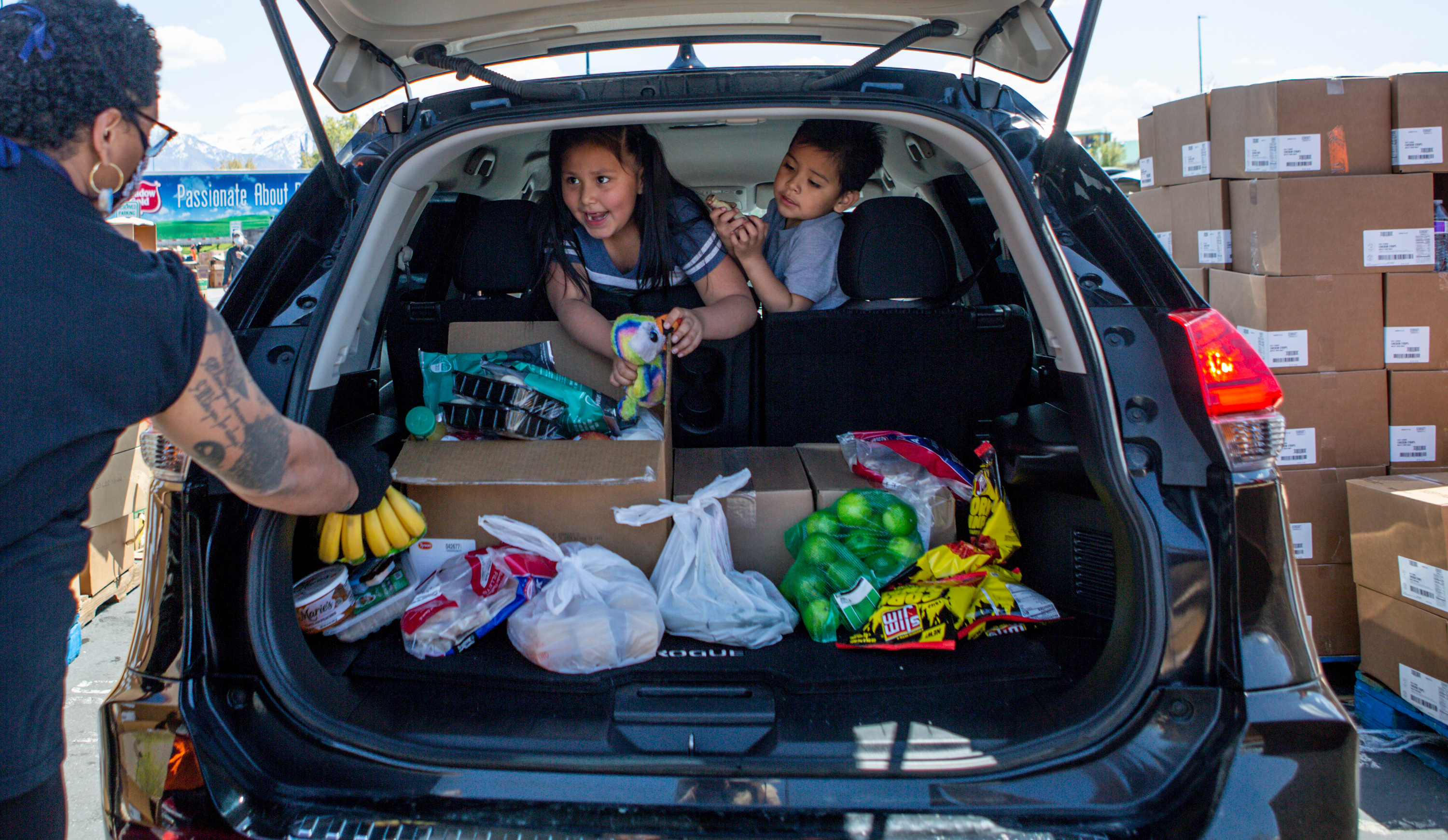 ‘It’s been a struggle’: As economic hardship persists in pandemic, thousands of Utahns wait in line for food