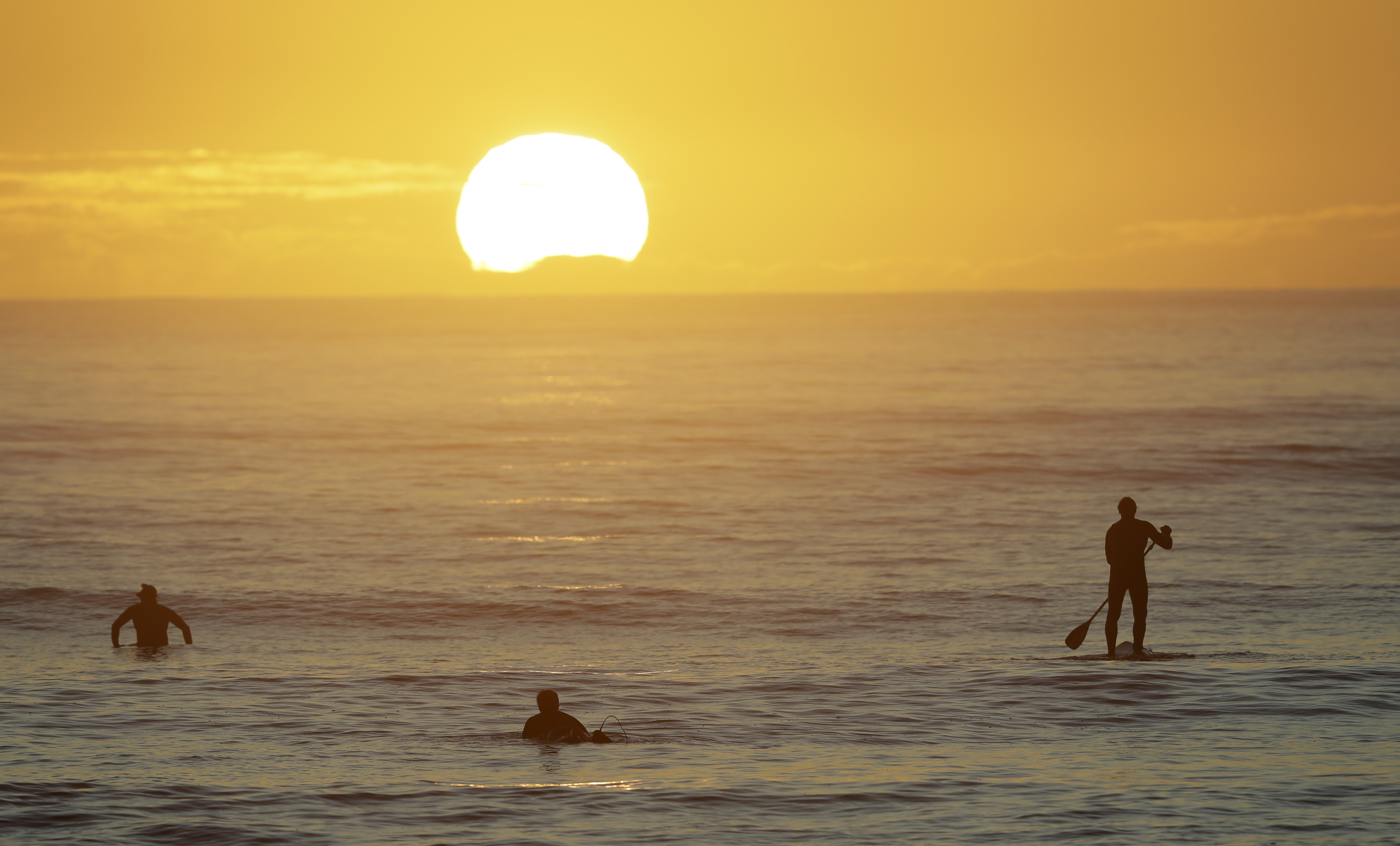 Asia Today: Surf's up, coffee's ready as New Zealand reopens