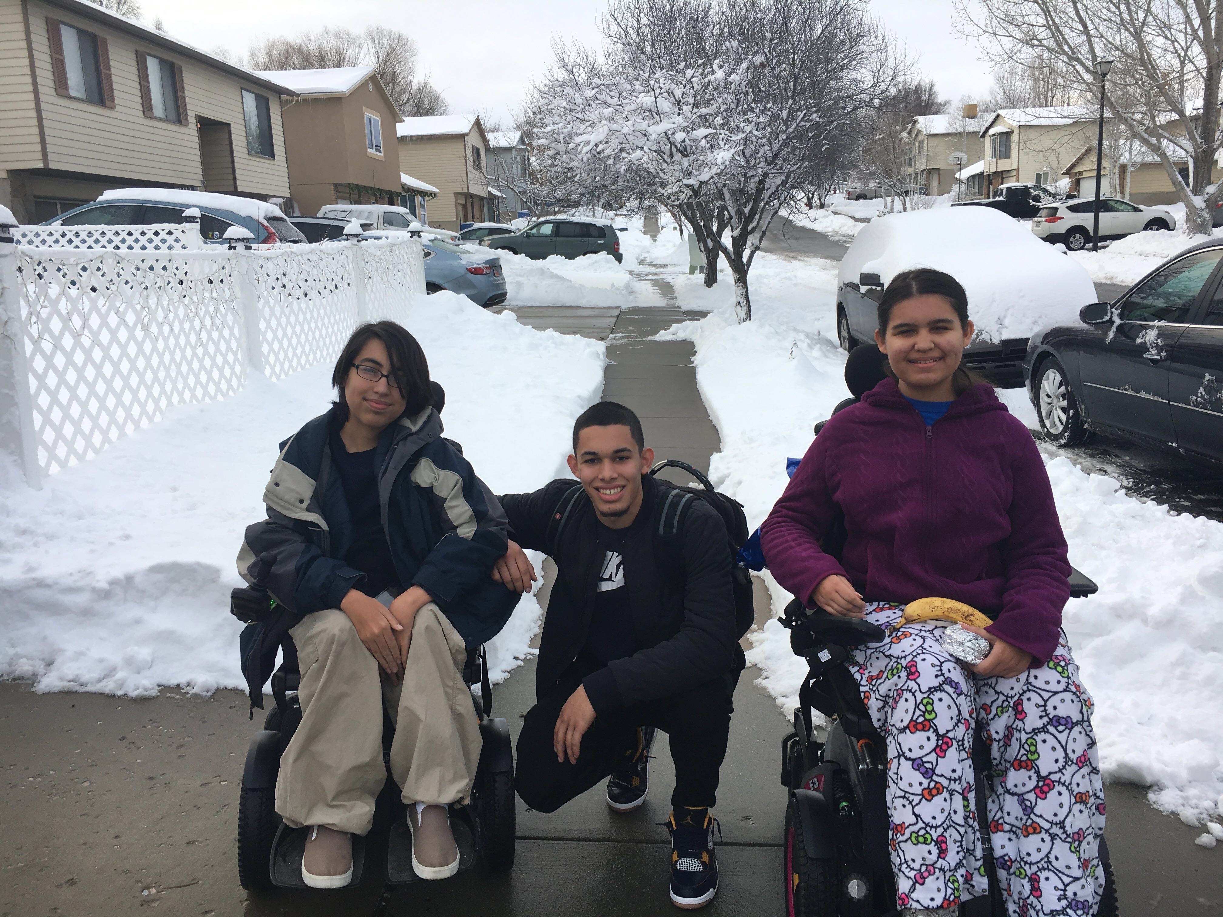 Isaiah Rivera poses with his two siblings, who have a rare genetic disease, spinal muscular atrophy, that affects their ability to walk, eat and even breathe normally. (Photo: Courtesy Isaiah Rivera)