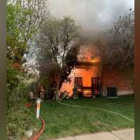 Residents credit strangers for alerting them to early-morning house fire in Layton