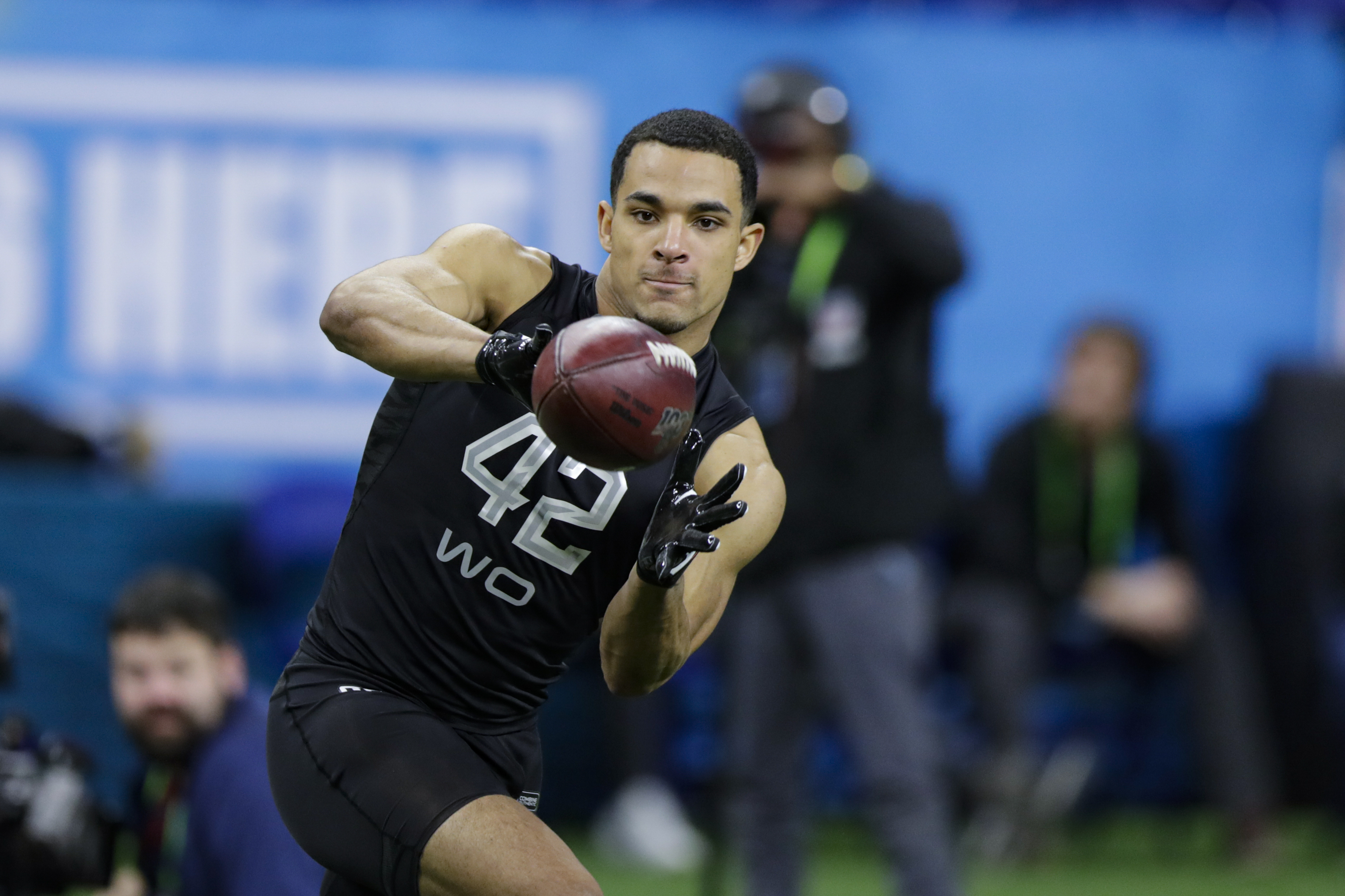 Record-setting Navy QB Perry will get NFL shot with Dolphins