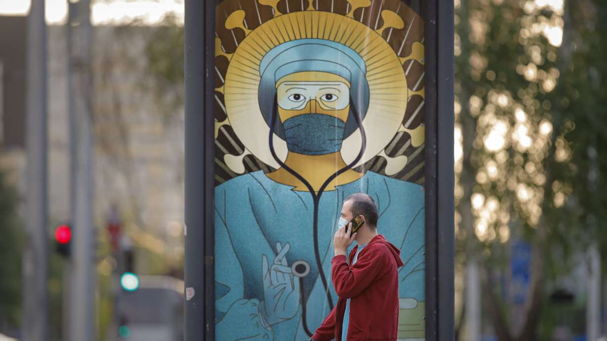 Romania: Orthodox Church blasts posters of doctors as saints