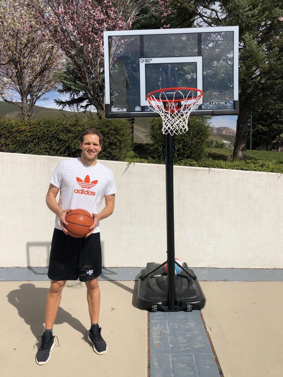 Bojan Bogdanovic stands next to his Lifetime hoop. (Courtesy of Landon Southwick)