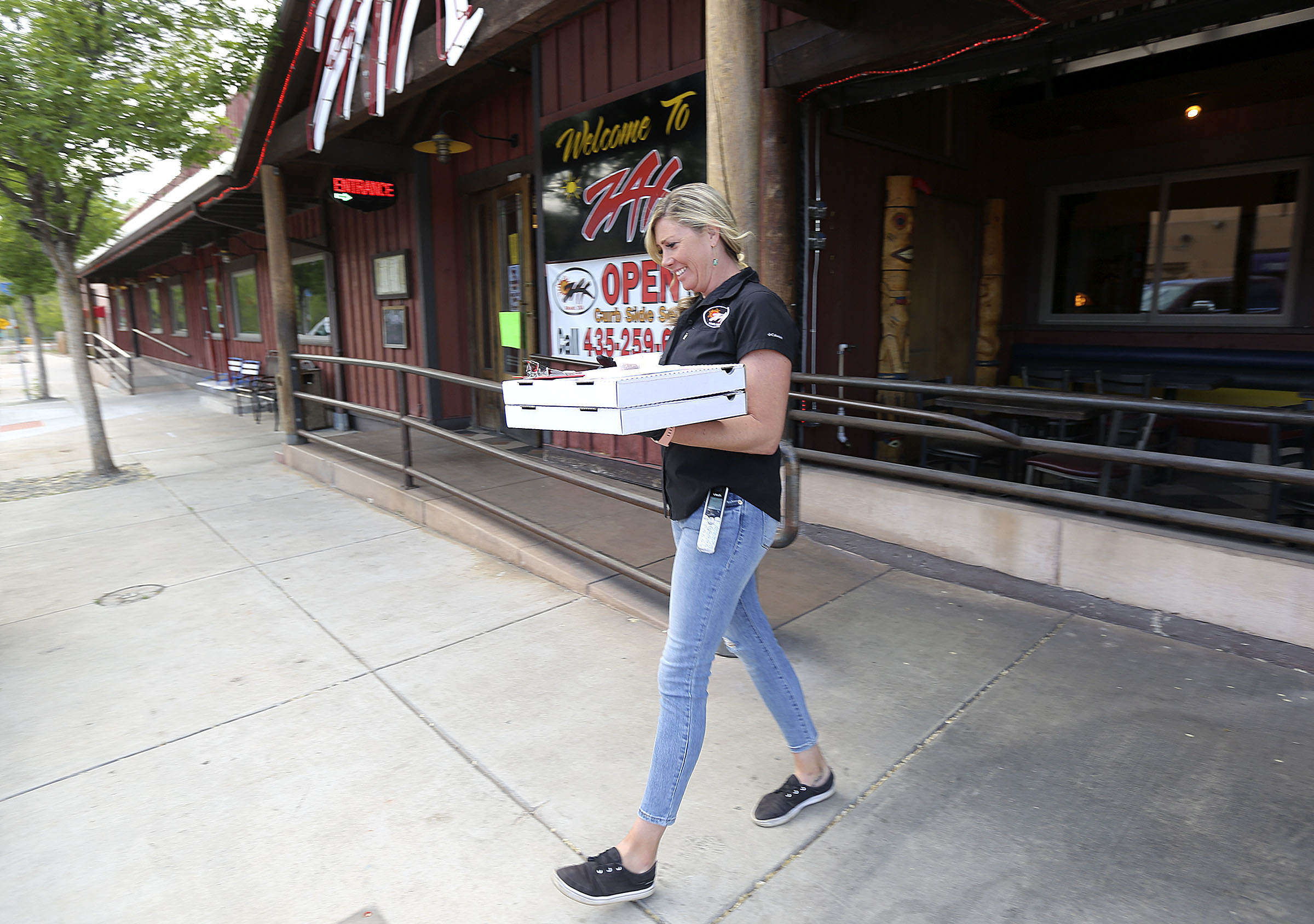 The dilemma of getting back to business in Utah tourist towns