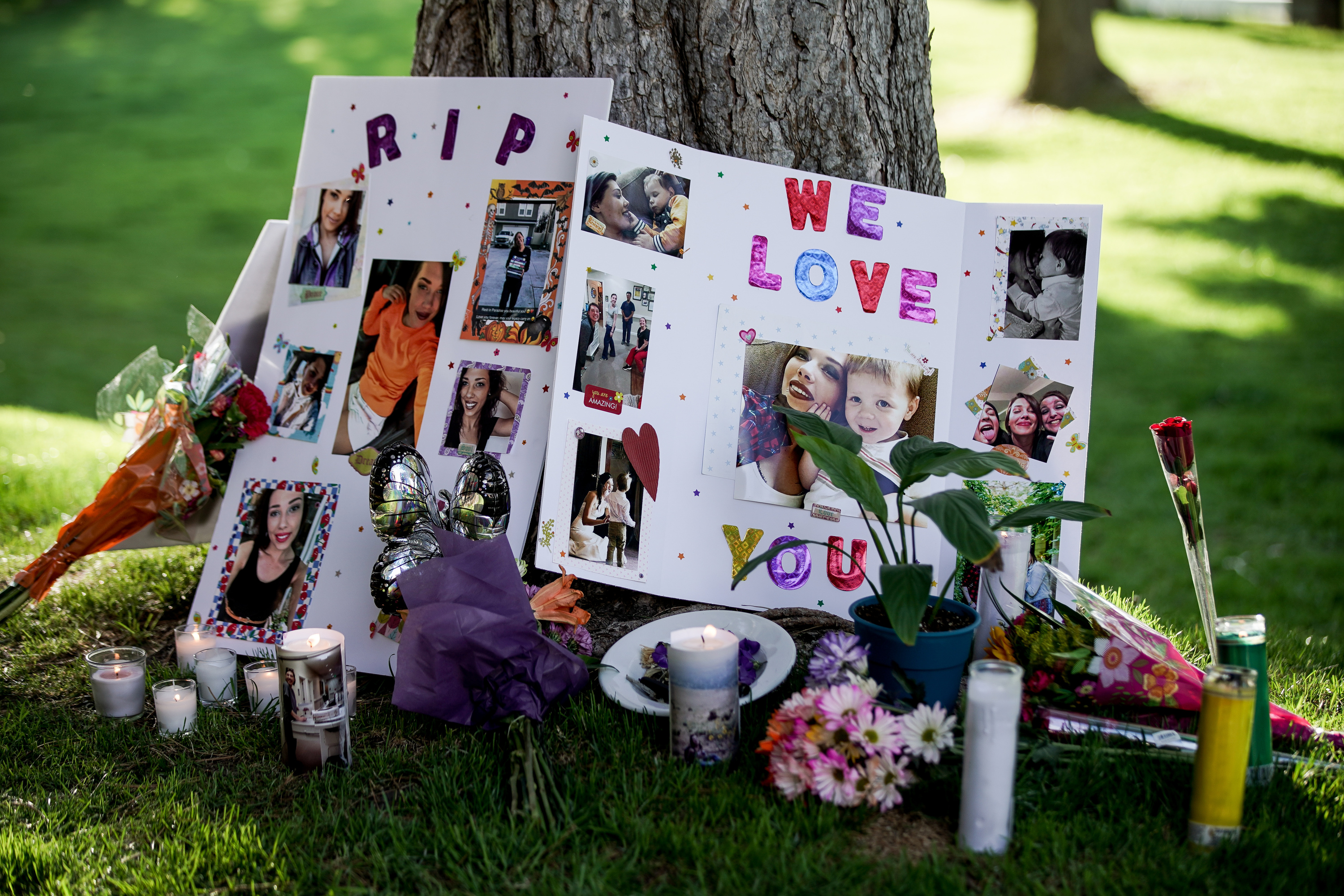 A memorial is set up at a vigil for Miranda Schachinger at the Candlestick Apartments in Midvale on Saturday, May 2, 2020. Schachinger, 26, was discovered dead by police in an apartment at the complex on Friday and appears to be the victim of an alleged murder-suicide. (Photo: Spencer Heaps, KSL)
