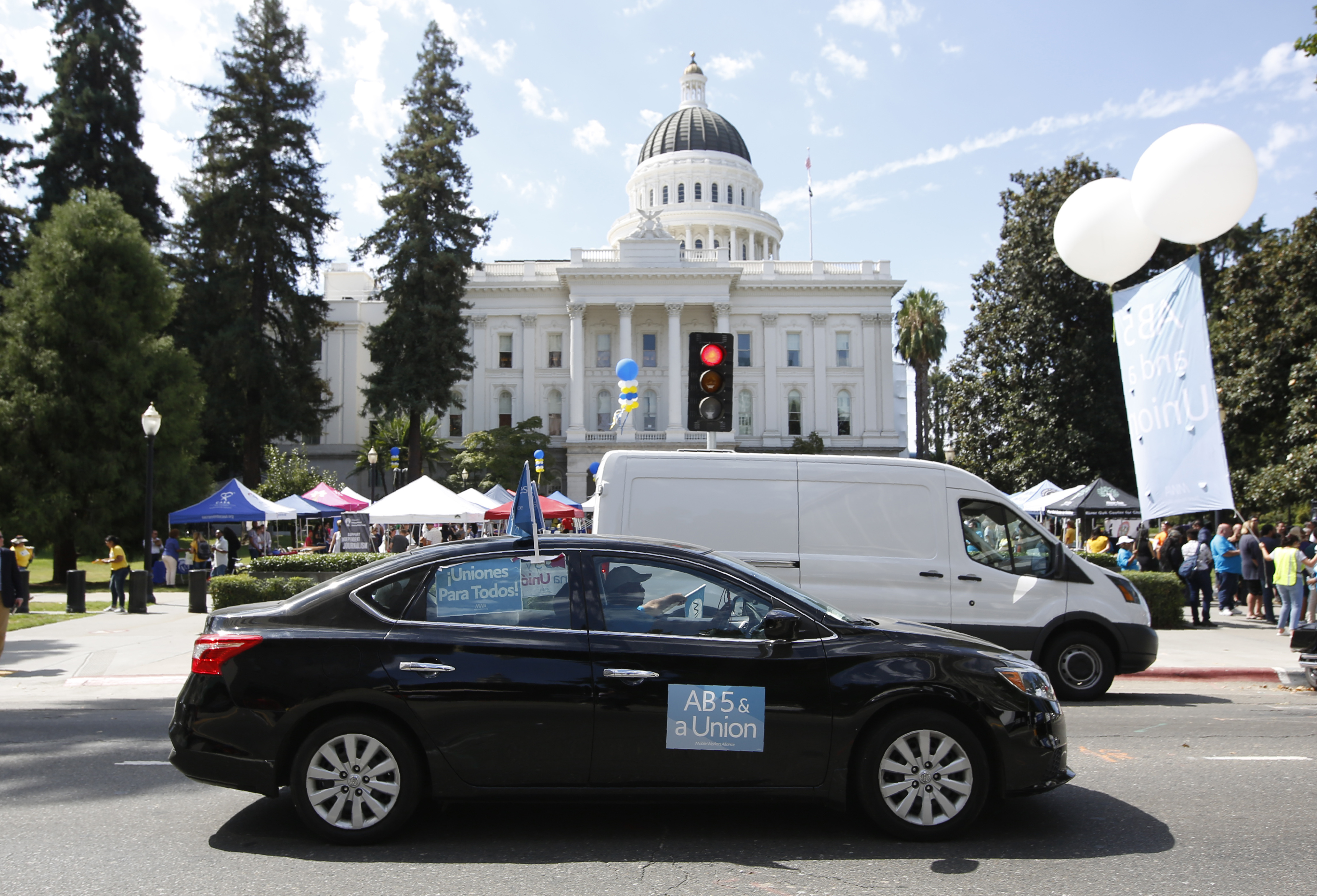 California sues Uber, Lyft over alleged labor law violations