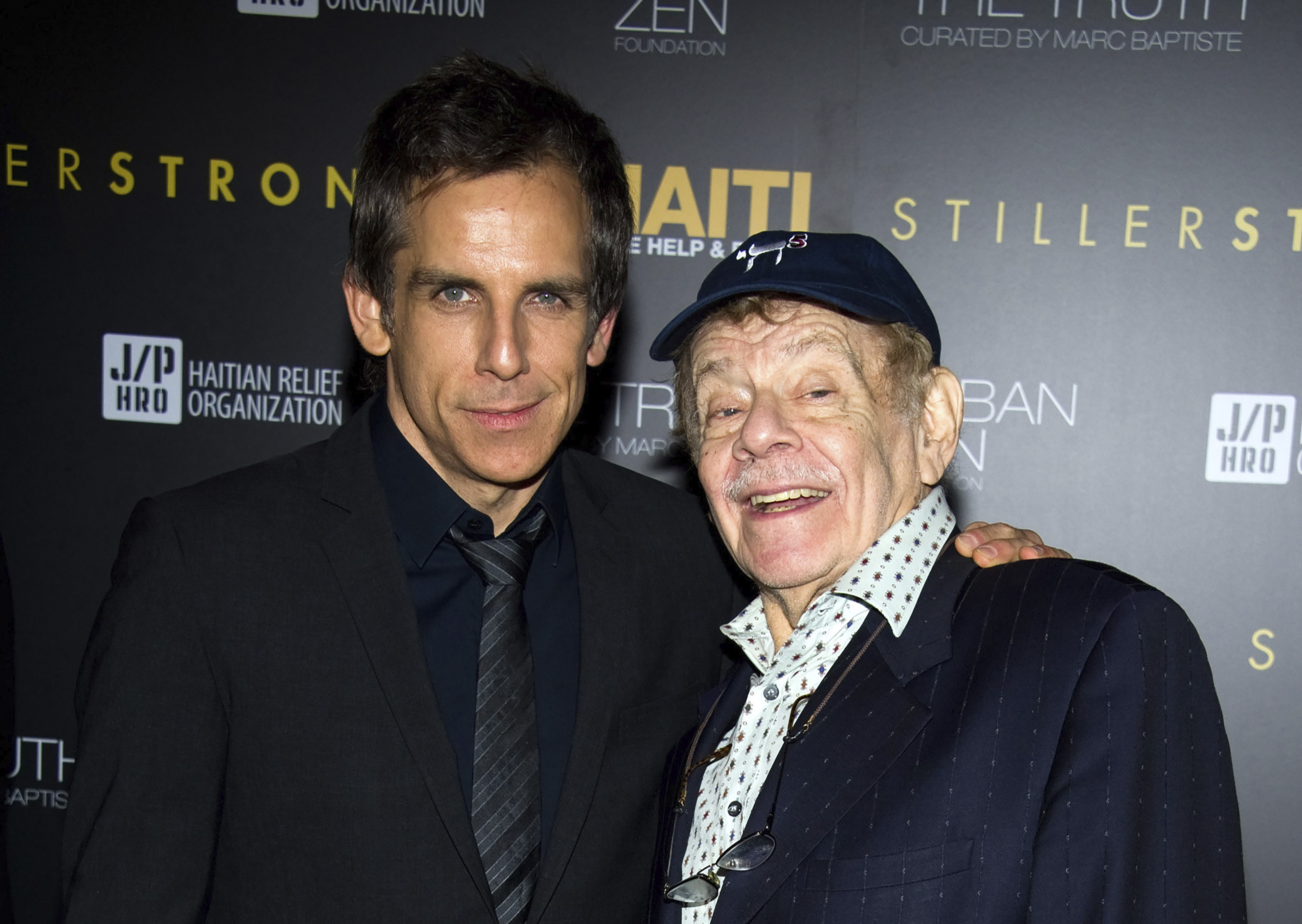 In this Feb. 11, 2011, photo, Ben Stiller, left, and his father Jerry Stiller arrive at the Help Haiti benefit honoring Sean Penn hosted by the Stiller Foundation and The J/P Haitian Relief Organization, in New York. (AP Photo/Charles Sykes, File)