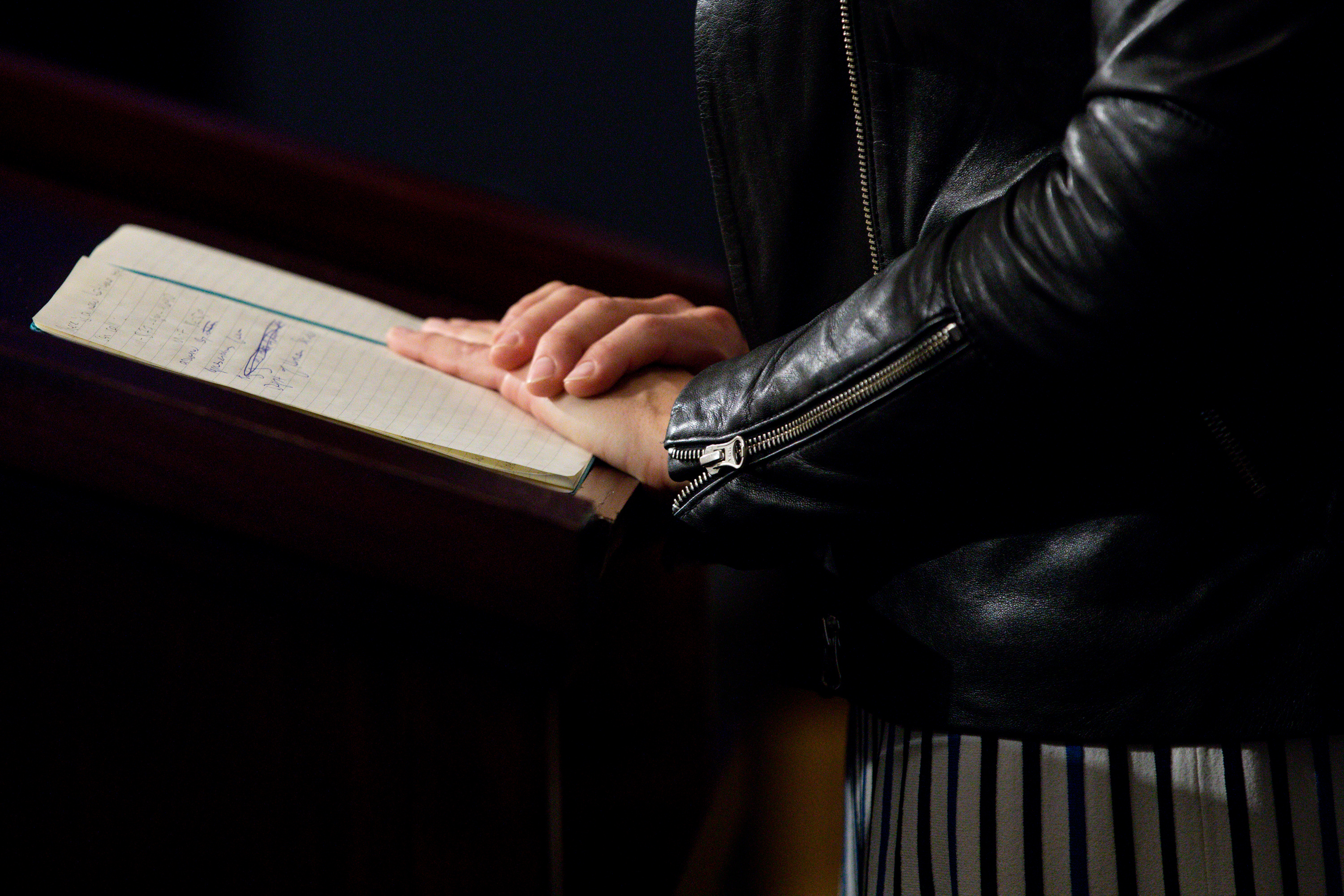 Dr. Angela Dunn, state epidemiologist with the Utah Department of Health, lays her hands on her notebook while speaking during the daily COVID-19 media briefing at the Capitol in Salt Lake City on Monday, May 11, 2020. (Photo: Ivy Ceballo, KSL)