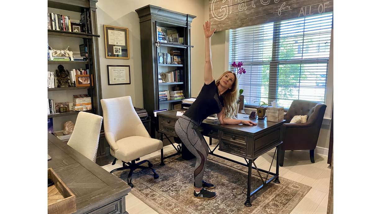 This exercise relieves the upper-body rigidity caused by a static sitting posture. The twisting motion, coordinated with your breathing, promotes mobility of your rib cage and thoracic spine while opening up the chest, side waist muscles and low back. (Photo: Courtesy of Dana Santas)