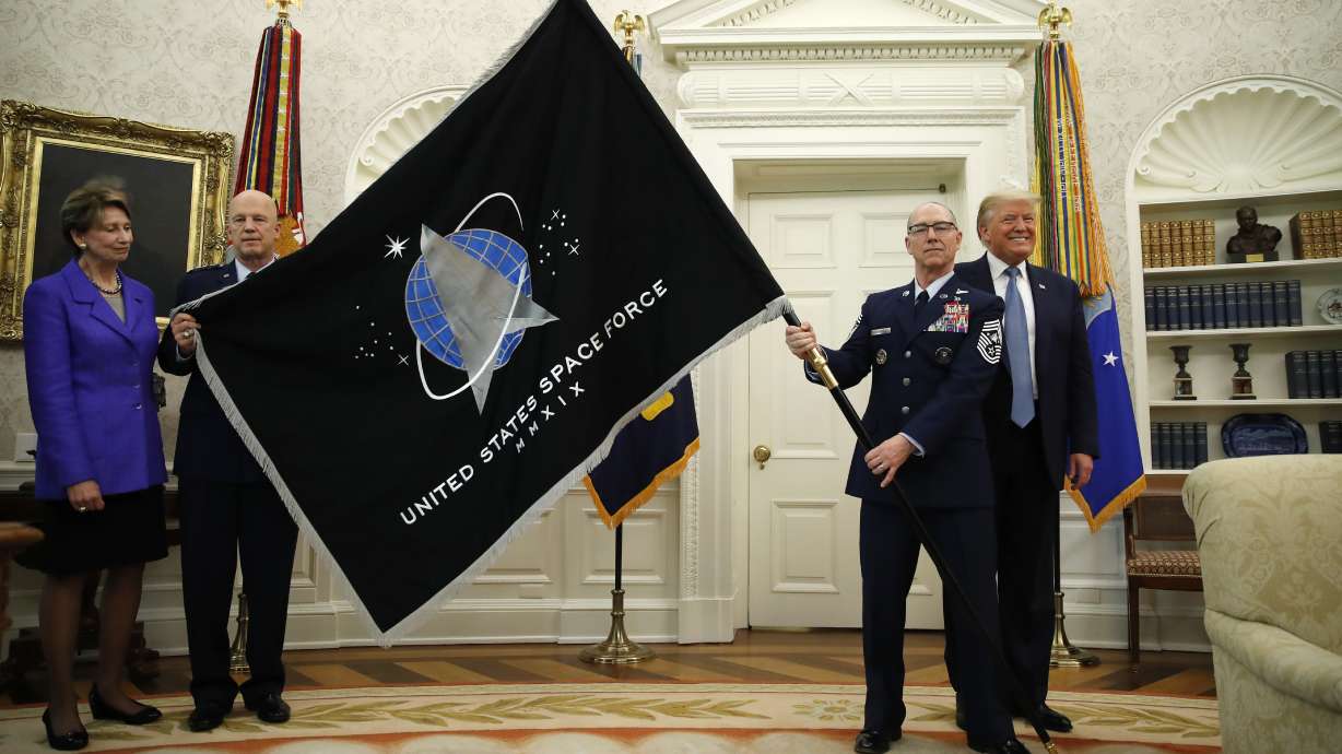 Space Force unveils flag; Trump touts 'super-duper missile'