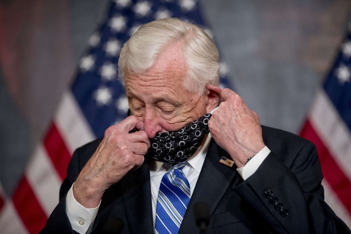 In this April 23, 2020, file photo, House Majority Leader Steny Hoyer of Md. takes his mask off to speak before the signing ceremony for the Paycheck Protection Program and Health Care Enhancement Act, H.R. 266, after it passed the House on Capitol Hill in Washington. It all started with the grandchildren. As Hoyer saw it, if he could Face Time with his grandkids, why not have Congress legislate by video chat and avoid the health risks of convening at the Capitol during the coronavirus pandemic. (Photo: Andrew Harnik, AP Photo, File)