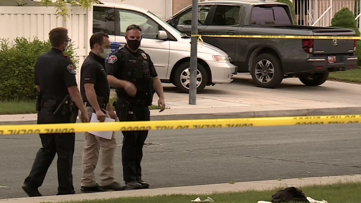 Police officers investigate a scene at Kings Pointe Park in West Valley City where an 18-year-old man died after being shot on May 20, 2020. A West Valley City man pleaded guilty Tuesday to manslaughter, admitting he negligently shot and killed the 18-year-old when he was 17.