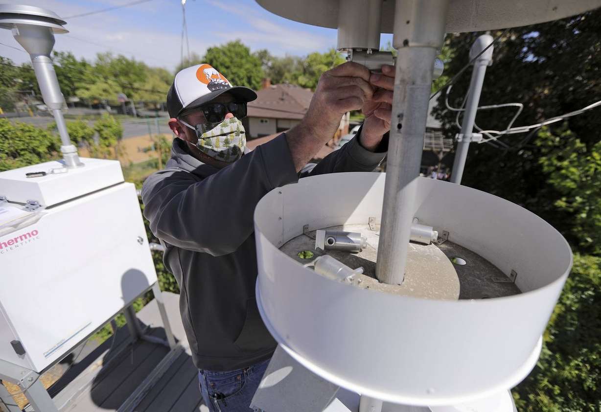 John Coombs, Utah Division of Air Quality environmental scientist, does monthly verification and weekly instrumentation setup on chemical speciation monitors at a station behind Hawthorne Elementary School in Salt Lake City on Tuesday, May 19, 2020. (Photo: Kristin Murphy, KSL)