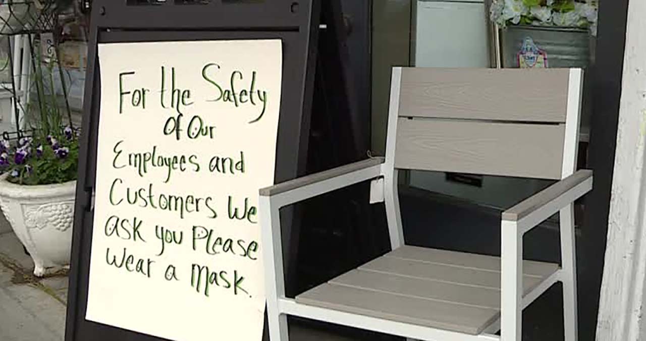 Sign outside Welcome Home in Sugarhouse asks customers to wear a mask Tuesday, May 19, 2020. (Photo: KSL TV)