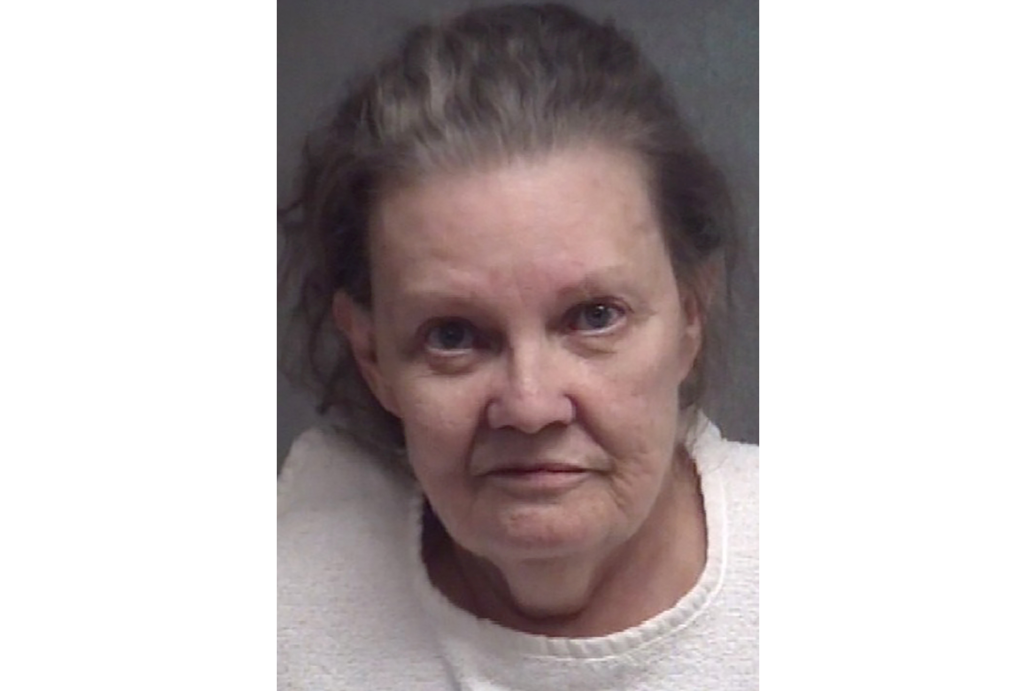 Woman who kept husband in freezer sues for return of body