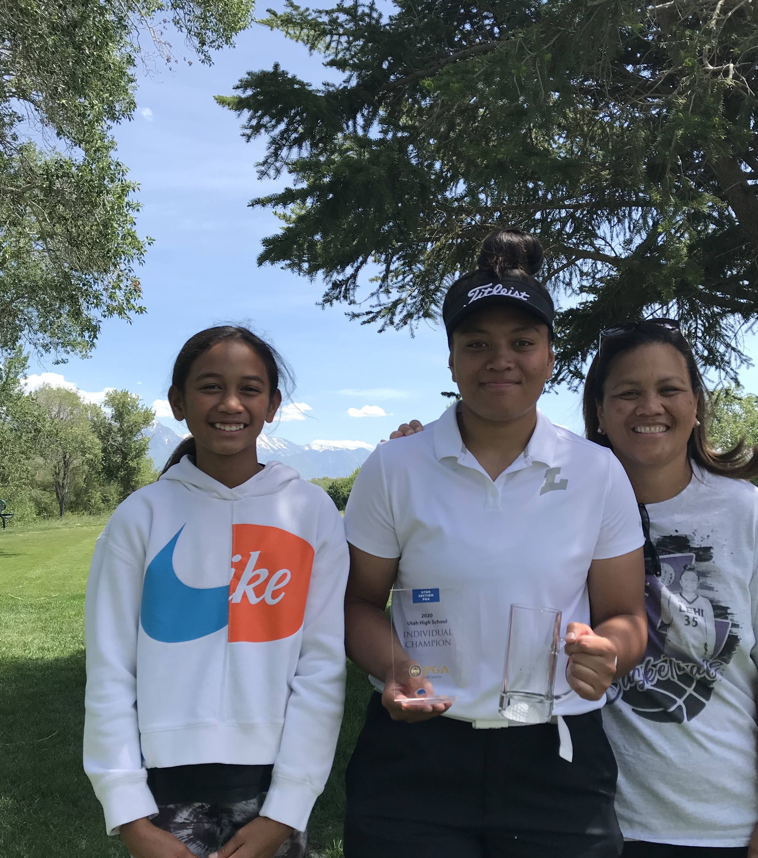 Lehi golfer Lila Galeai, center, shot a 5-under-par 68 to finish first at the 5A individual state meet, hosted by the Utah Section PGA, at Fox Hollow Golf Club in American Fork. (Photo: Sean Walker, KSL.com)