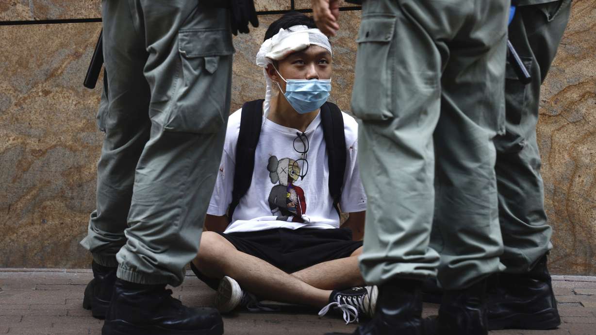 China says US action on Hong Kong 'doomed to fail'