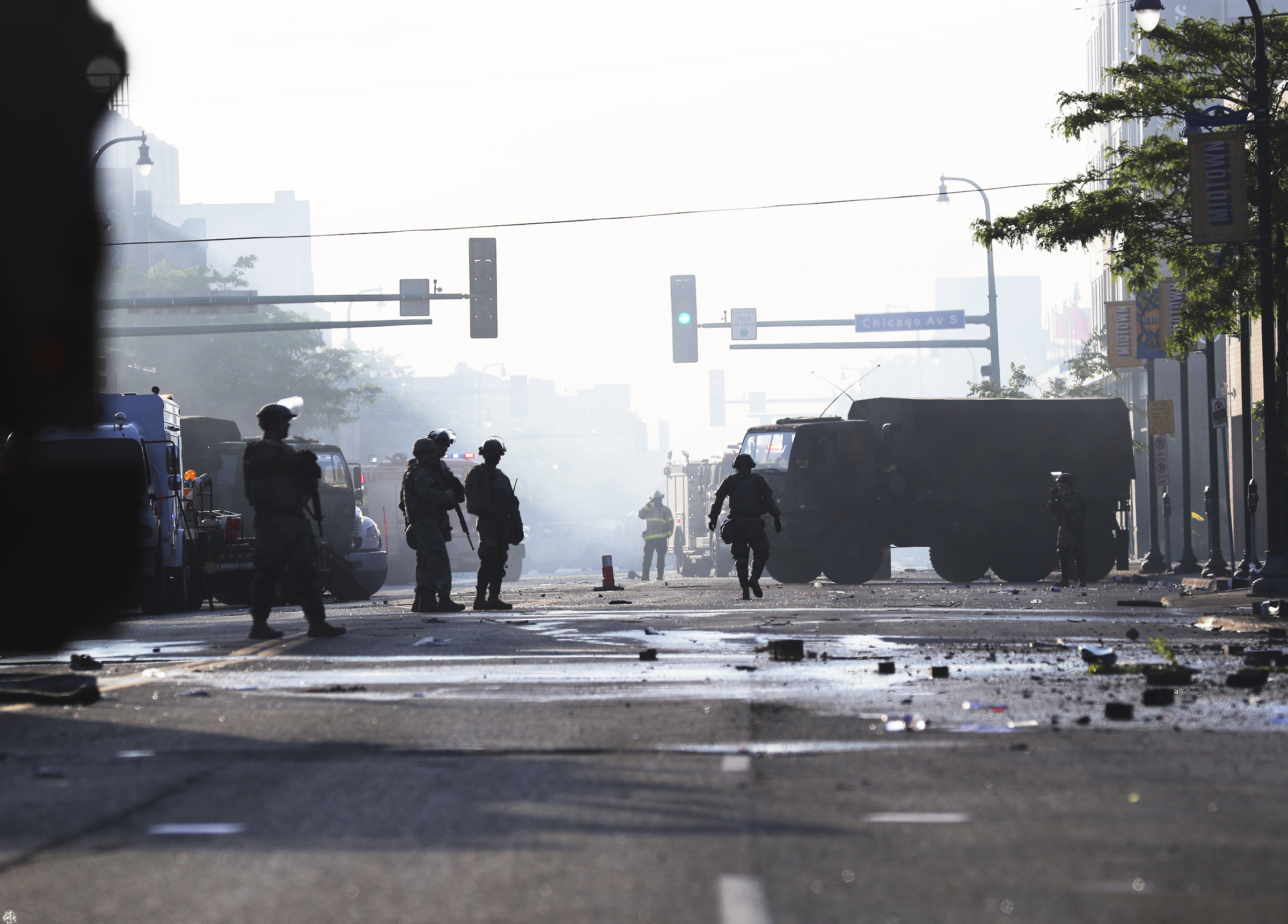 The Latest: One dead in Indianapolis shootings amid protests