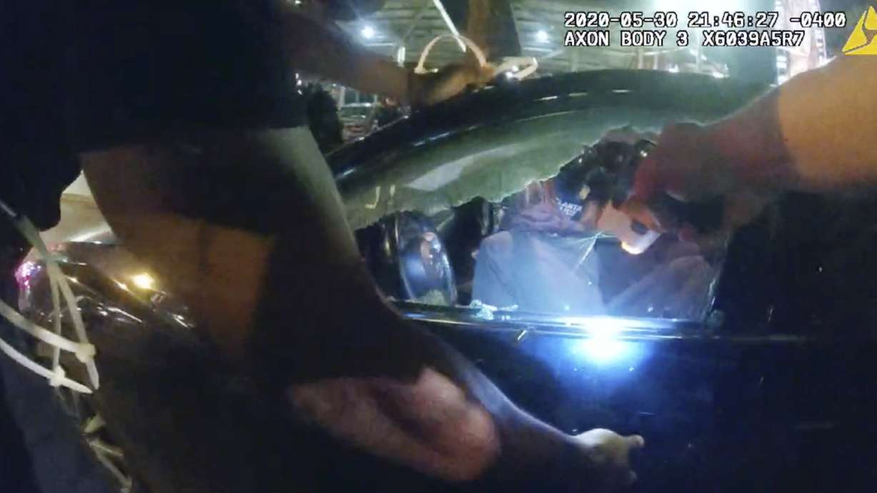 Woman pulled from car by police says she feared for her life