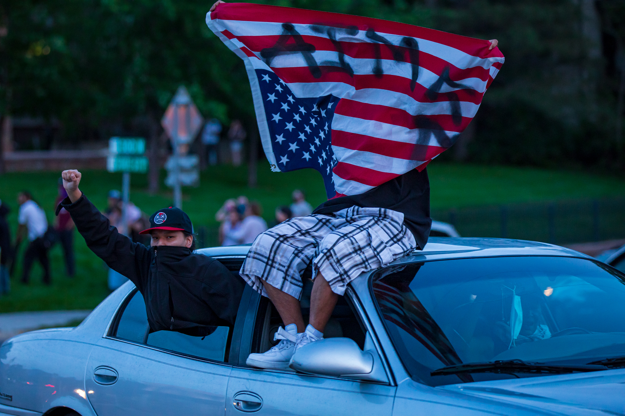 Protesters drive past a line of Utah Highway Patrol officers at the Utah State Capitol after a statewide curfew of 8 p.m. went into effect in Salt Lake City on Monday, June 1, 2020. Earlier in the evening, protesters held a peaceful protest and march downtown to stand “in solidarity with” the people of Minneapolis and across the nation protesting George Floyd's killing and other injustices against racial minorities. (Photo: Carter Williams, KSL.com)