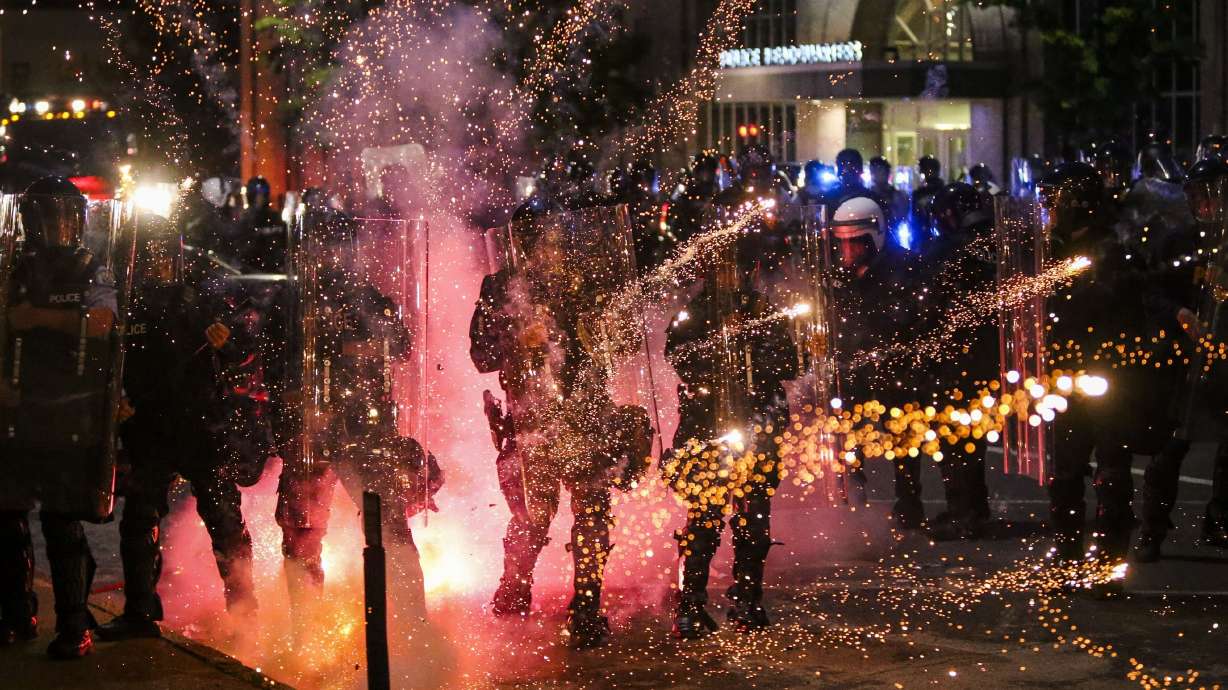 The Latest: Thousands on New York City streets after curfew