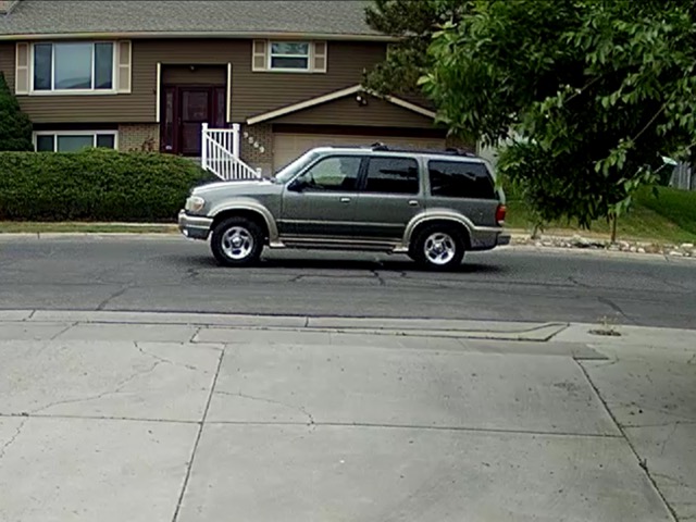 2 charged with murdering Sandy teen in front of his home