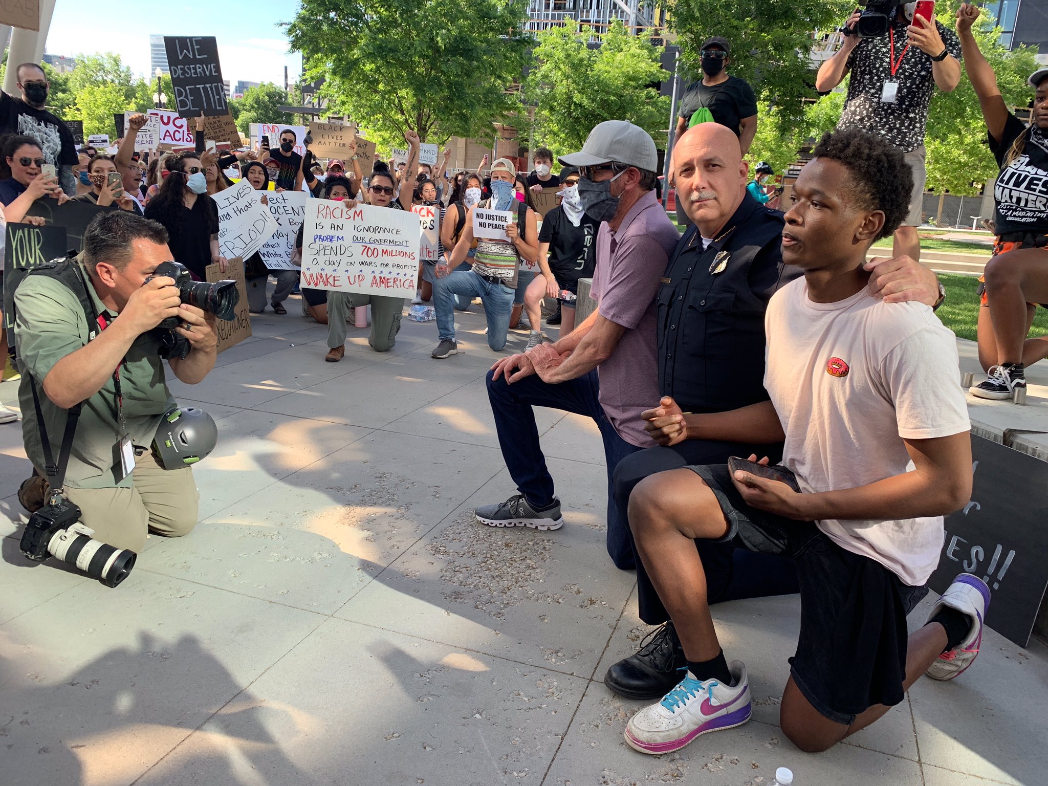 Salt Lake City Police Chief Mike Brown took a knee with protesters Wednesday, June 3, 2020, as people flooded the Public Safety Building plaza. Wednesday marked the third straight night of peaceful protests in Salt Lake City calling for justice in Floyd's death. (Photo: Jay Hancock, KSL TV)