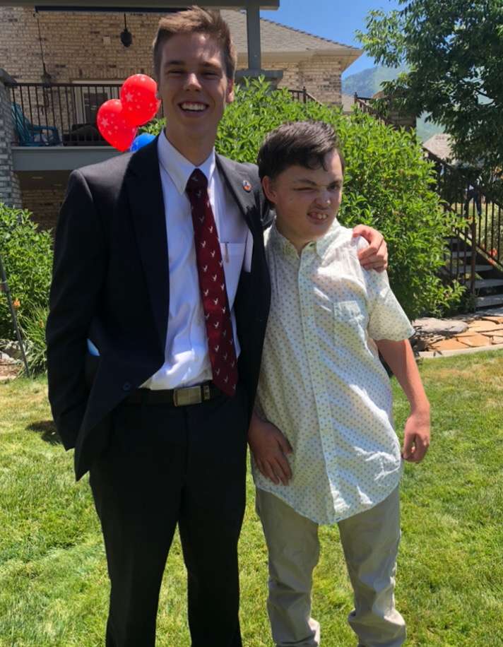 Caleb Johnson poses with his friend Cory Derfier at his wedding. Caleb died in a car accident just weeks later. (Photo: Family photo)